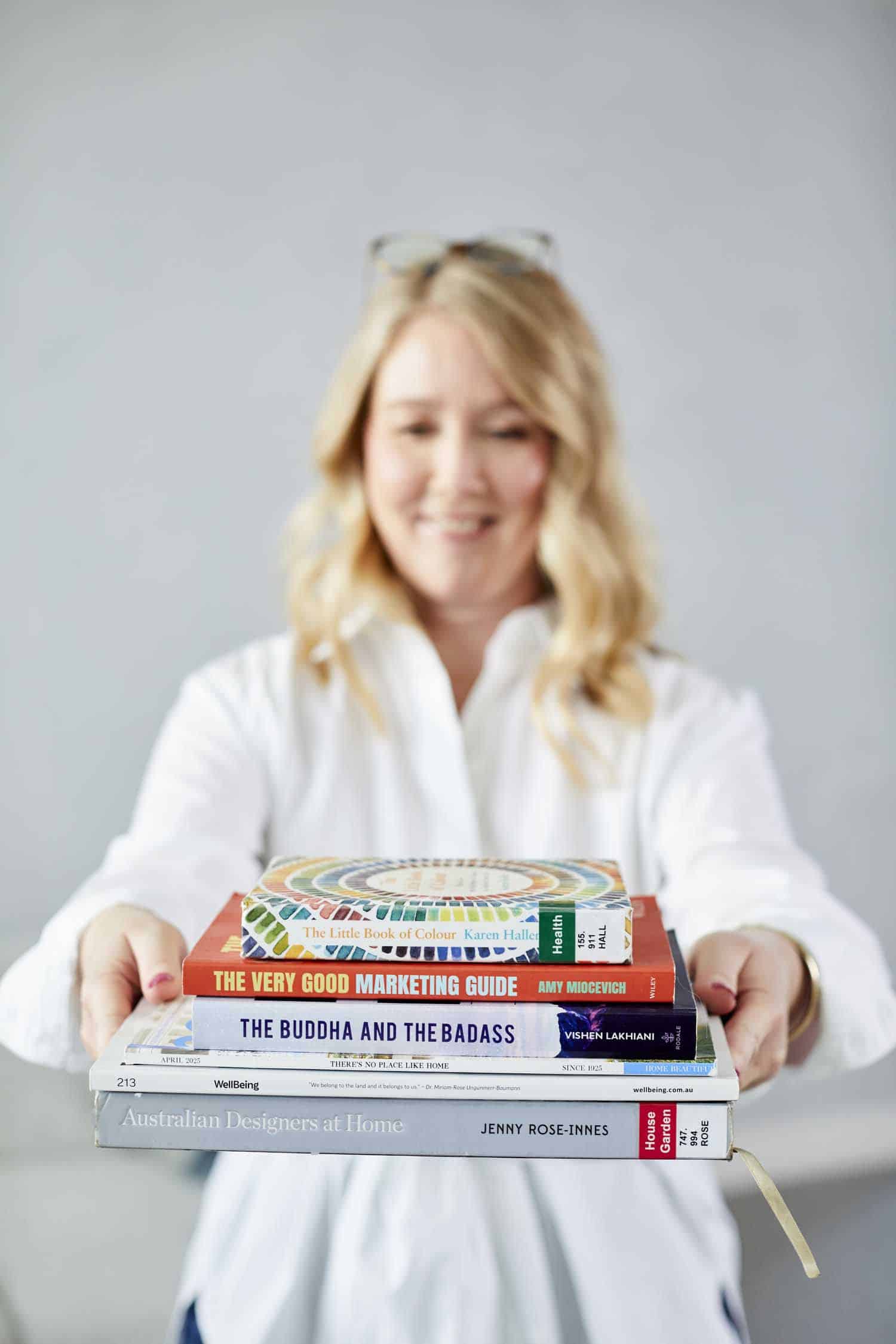 business owner holding books